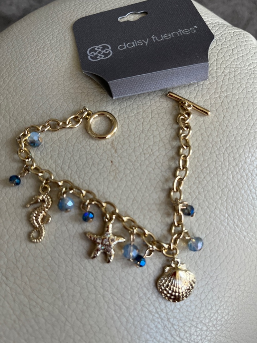 Daisy Fuentes Gold Sea Charm Bracelet with Blue Crystal Accents!  New.